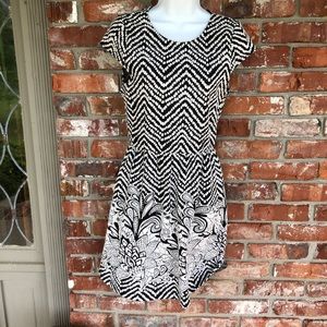 The impeccable pig black and white dress size M